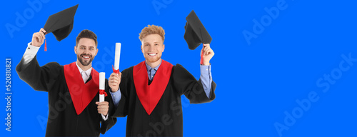 Happy male graduating stude...