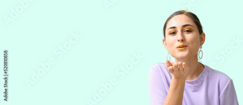 Attractive young woman with...