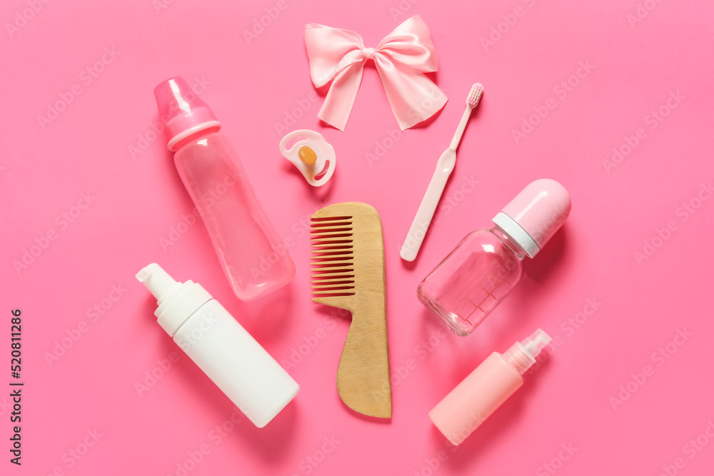 Obraz premium Bath accessories for baby girl on pink background