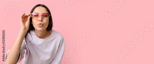 Young woman wearing stylish...