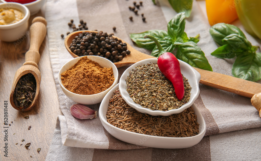 Assortment of aromatic spices on table Assortment of aromatic spices on table