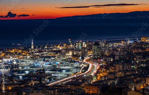 GENOA (GENOVA), ITALY, JANUARY 10, 2022 - Aerial view of the city of Genoa (Genova) at dusk, Italy. photo
