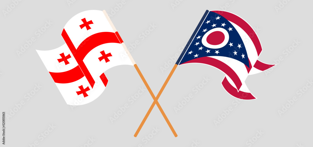 Crossed and waving flags of Georgia and the State of Ohio Crossed and waving flags of Georgia and the State of Ohio