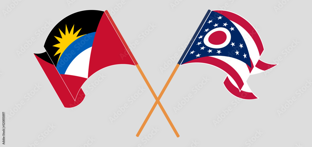 Crossed and waving flags of Antigua and Barbuda and the State of Ohio