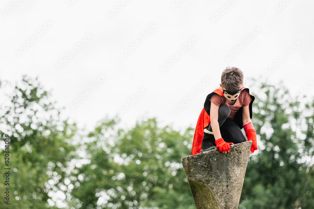 Superhero in hedgehog mask in park Superhero in hedgehog mask in park