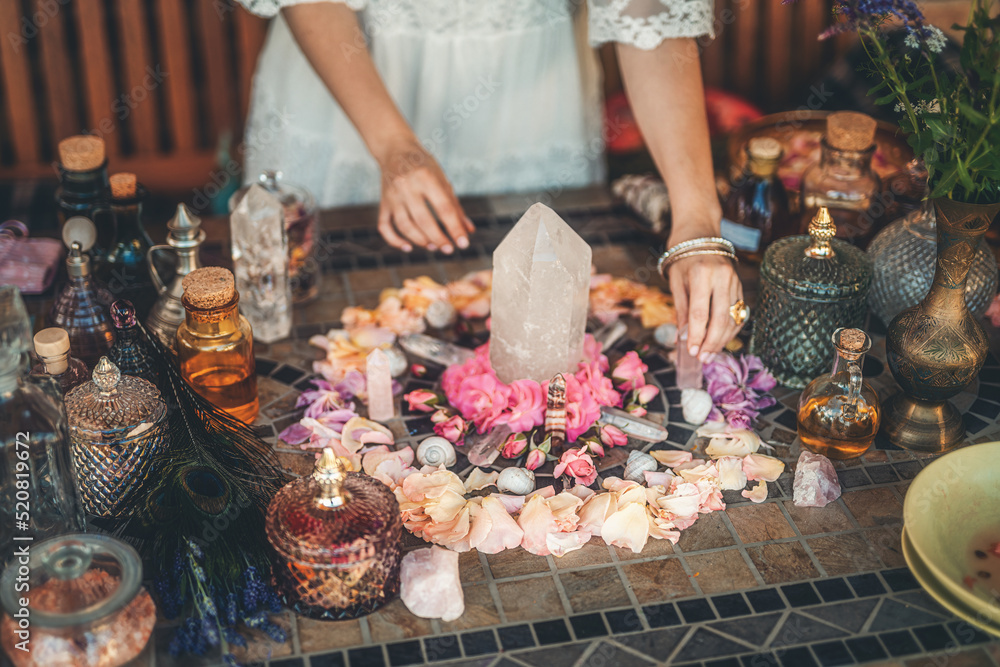 beautiful altar with crystals and rose flowers.