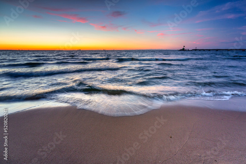 Sunset on the beach of the Baltic Sea in Gdansk, Poland
