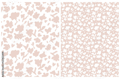 Simple Hand DrawnFloral Seamless Vector Pattern with  Abstract Flowers on a White and Light Blush Pink Background. Infantile Calico Style Garden with Tiny Doodle Flowers Made of Brush Scribbles.