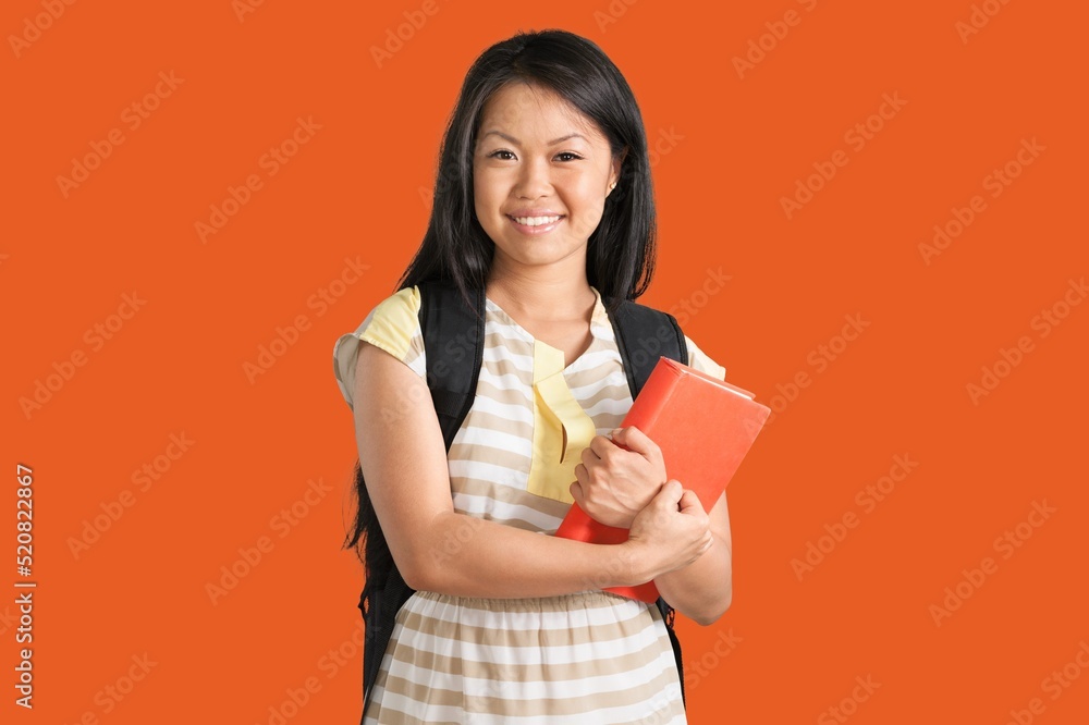 Funny teen student girl posing. Education in high school university college concept. Funny teen student girl posing. Education in high school university college concept.