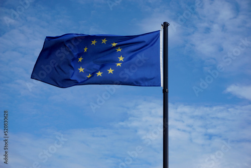 European union flag in the blue sky
