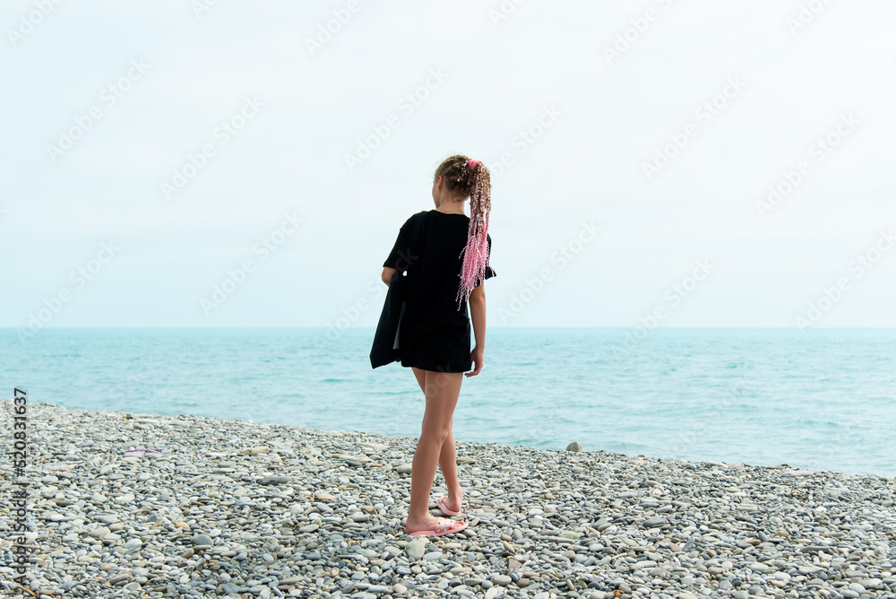 Teenage girl on the beach. Summer. Vacation.