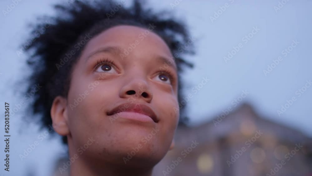 Teenagers eyes widen as something on a screen makes them react, in slow motion Teenagers eyes widen as something on a screen makes them react, in slow motion