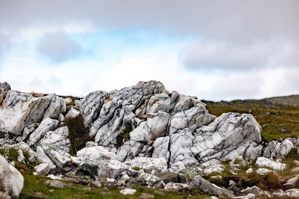 white stones on the route to Knivskjellodden on Mageroya Island, North Cape (Nordkapp), Finnmark, Norway