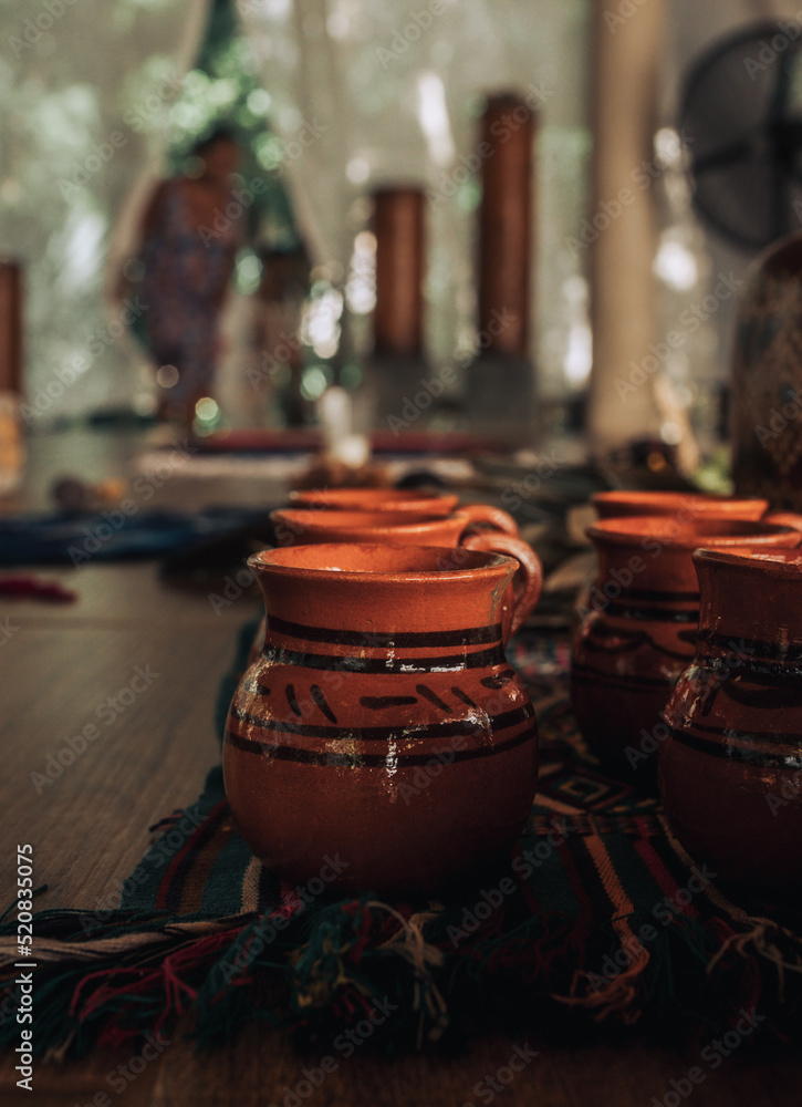 Fototapeta premium Traditional Mexican ceramic pot for cocoa ceremony in Tulum on a sunny afternoon