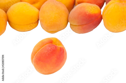 Beautiful apricots on a white texture. Isolated ripe peaches. Juicy white plums on a light background. Fruit growing concept.