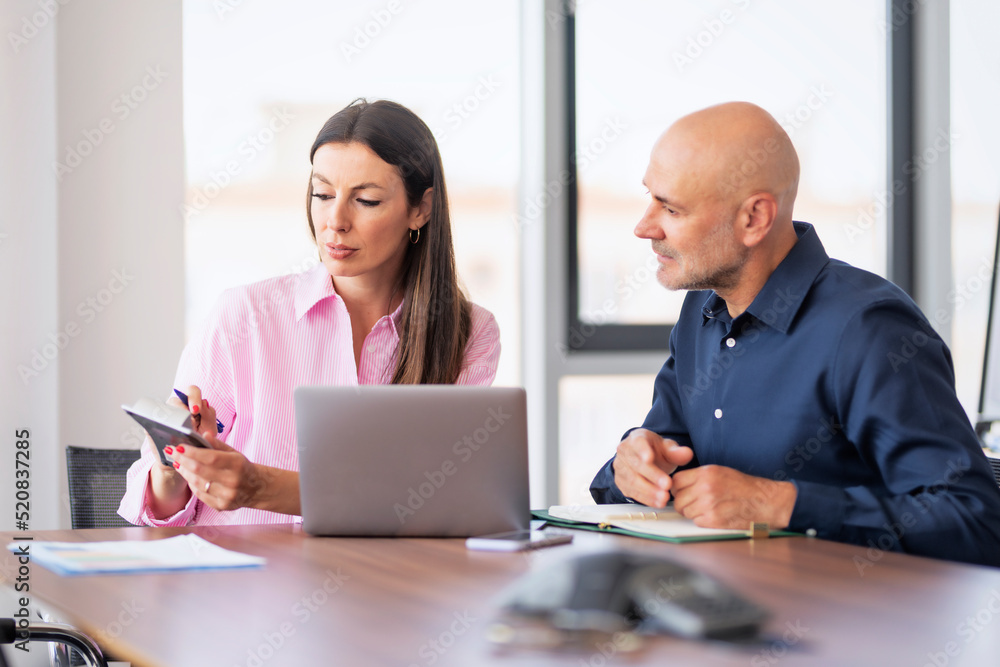 Group of business people working together at the office Group of business people working together at the office