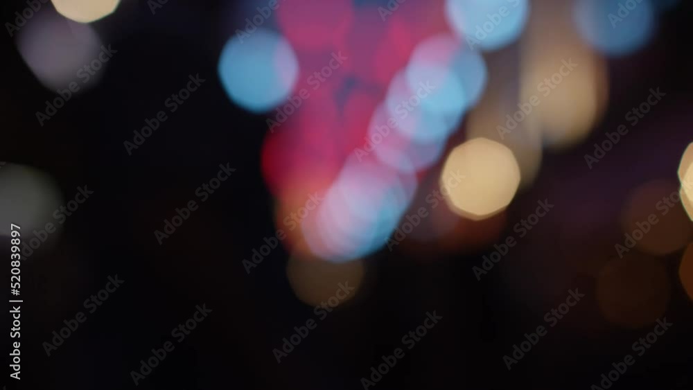 Blurred background of city nightlife, in slow motion Blurred background of city nightlife, in slow motion