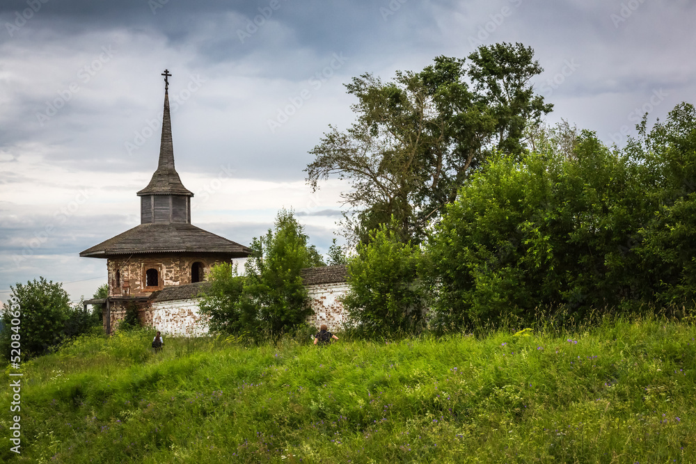 Russia, Vologda Oblast, Morozovitsa, 07. 21.2017. The tower of the Russian Orthodox Troitse-Gledensky Monastery in the village of Morozovitsa near the town Veliky Ustyug in summer Russia, Vologda Oblast, Morozovitsa, 07. 21.2017. The tower of the Russian Orthodox Troitse-Gledensky Monastery in the village of Morozovitsa near the town Veliky Ustyug in summer