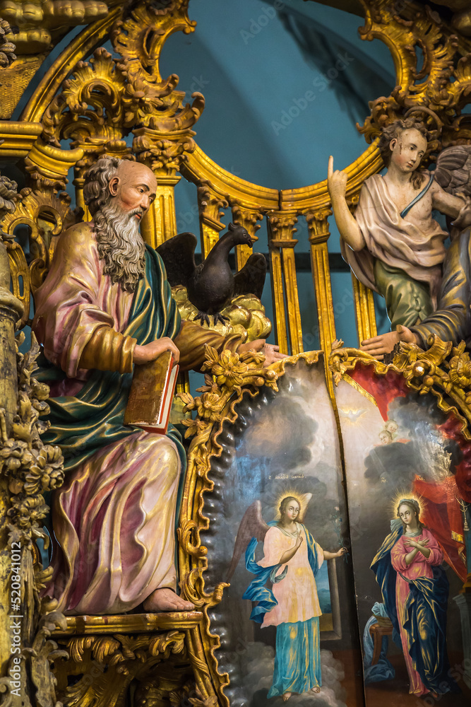 Fototapeta premium Russia Vologda Oblast Morozovitsa 07 21 2017 The fragment of 18th century wooden baroque iconostasis in the orthodox Troitse-Gledensky Monastery in the village of Morozovitsa near Veliky Ustyug