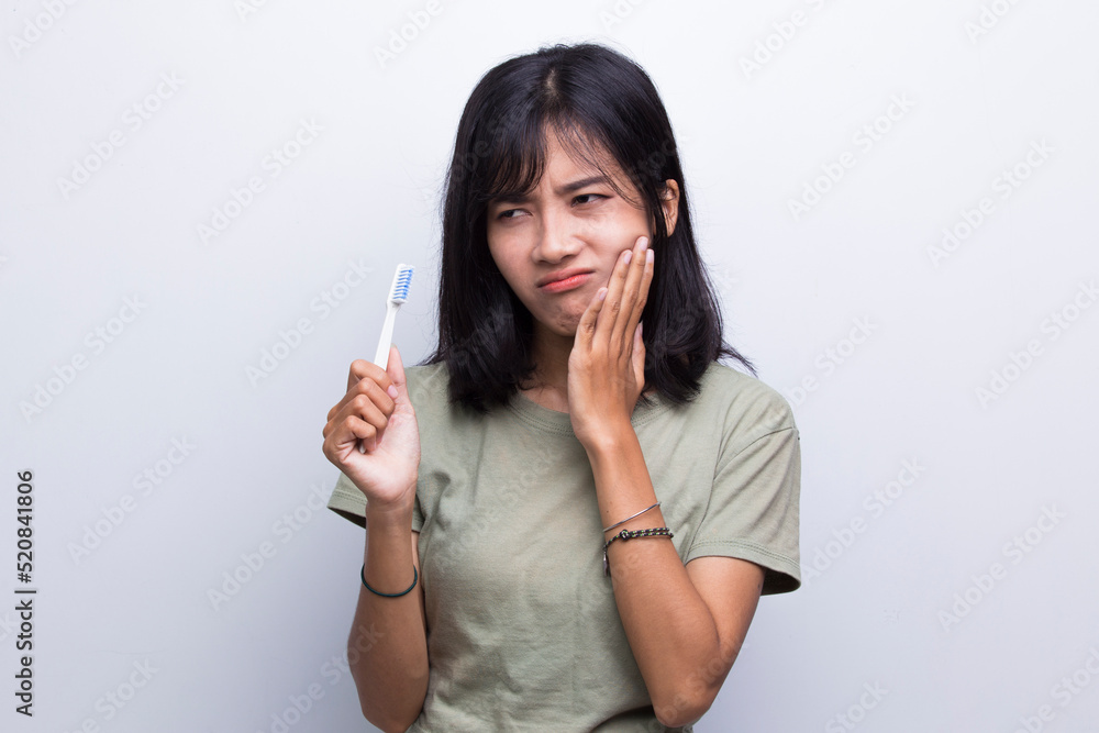beautiful young woman suffering from toothache pain, tooth decay, tooth, dental care concept on white background
beautiful young woman suffering from toothache pain, tooth decay, tooth, dental care concept on white background
