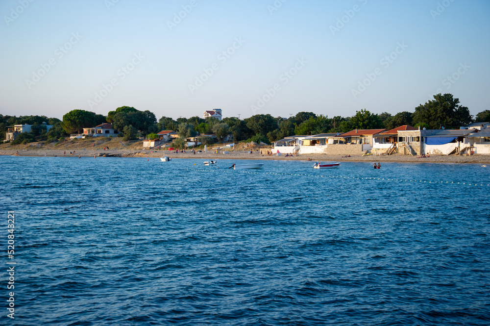 Beach on a hot summer day. sea ​​sand and trees