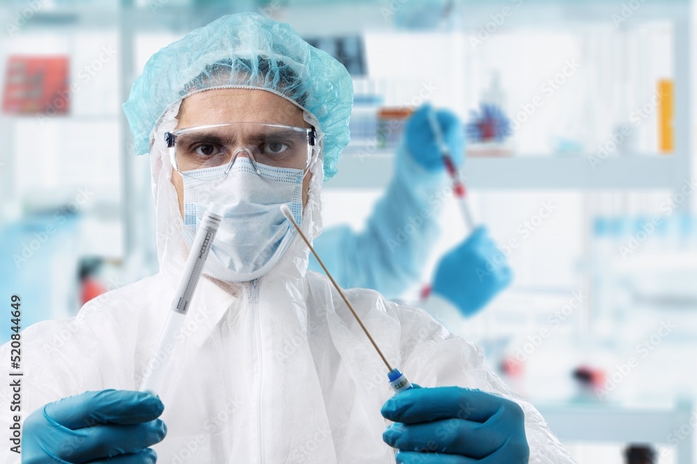 Lab technician researching for analysis in the laboratory. Microbiologist working and examining mold and fungal culture Lab technician researching for analysis in the laboratory. Microbiologist working and examining mold and fungal culture