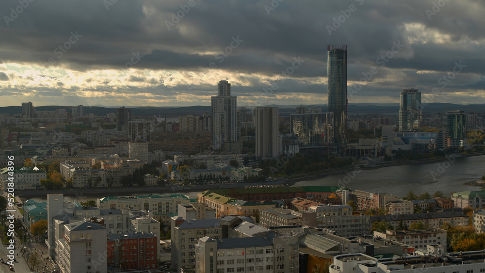 The view from the drone.Beautiful Yekaterinburg.Stock footage.Gray City, the largest of the Urals, filmed in the center of the city with all the high-rises and the long Iset River is visible.