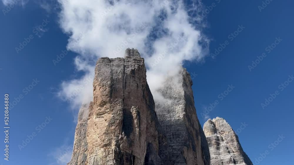 Panoramic view on Tre Cime mountains in Dolomites region in Italy Panoramic view on Tre Cime mountains in Dolomites region in Italy