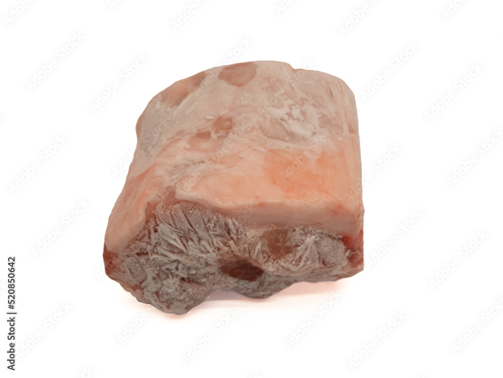Frozen raw pork. Frozen raw meat. Piece of frozen meat on a white background. Frozen raw pork. Frozen raw meat. Piece of frozen meat on a white background.