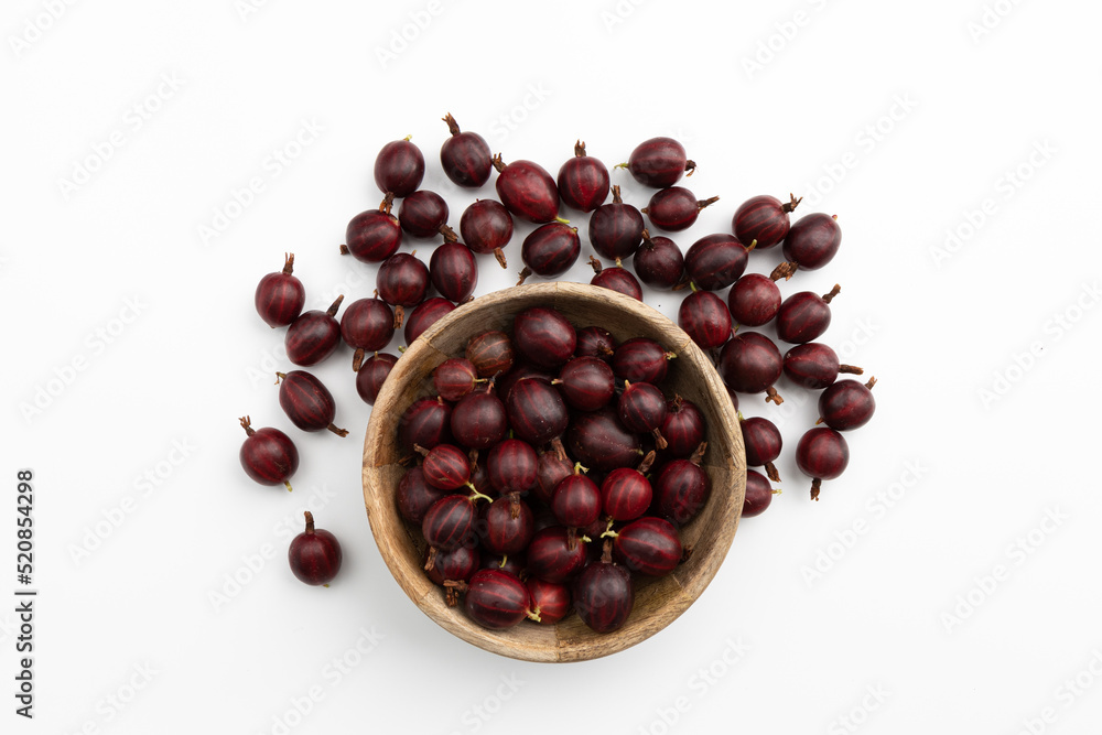 fresh red gooseberry isolated on white background, top view fresh red gooseberry isolated on white background, top view