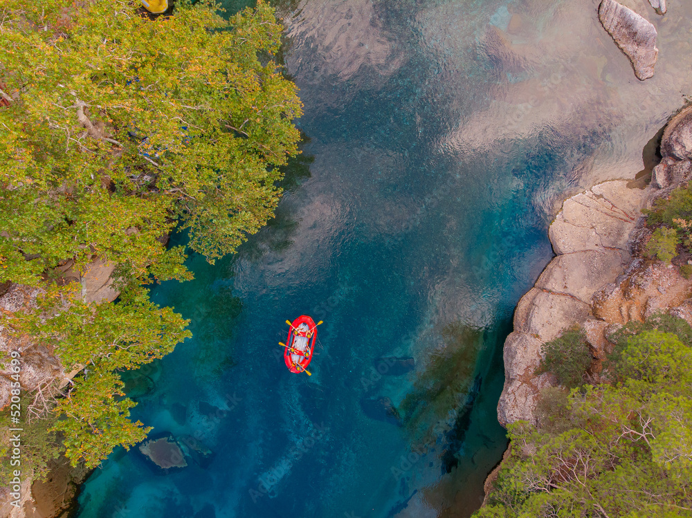 Rafting on red boat on blue river Turkey, aerial top view. Concept adventure extreme travel - obrazy, fototapety, plakaty 