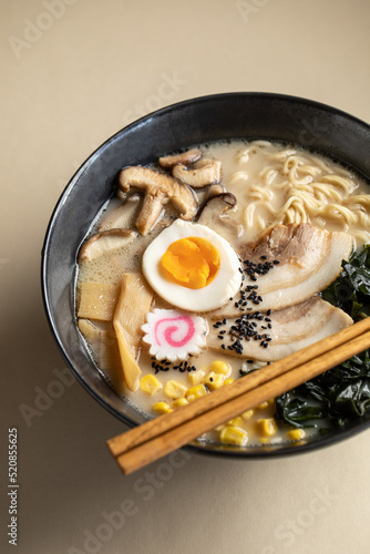 Tasty ramen with mushrooms and egg photo