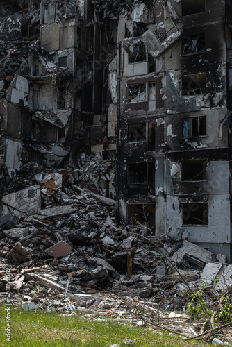 War in Ukraine 2022. Destroyed, bombed and burned residential building after Russian missiles in Kharkiv Ukraine. Famous building on Natalia Uzhviy street. Russian attack.  © Ievgeniia