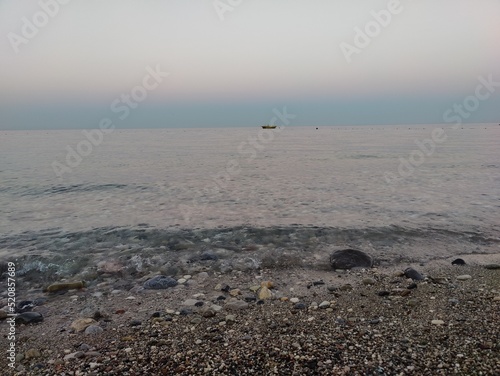 Boat on the beach in the evening