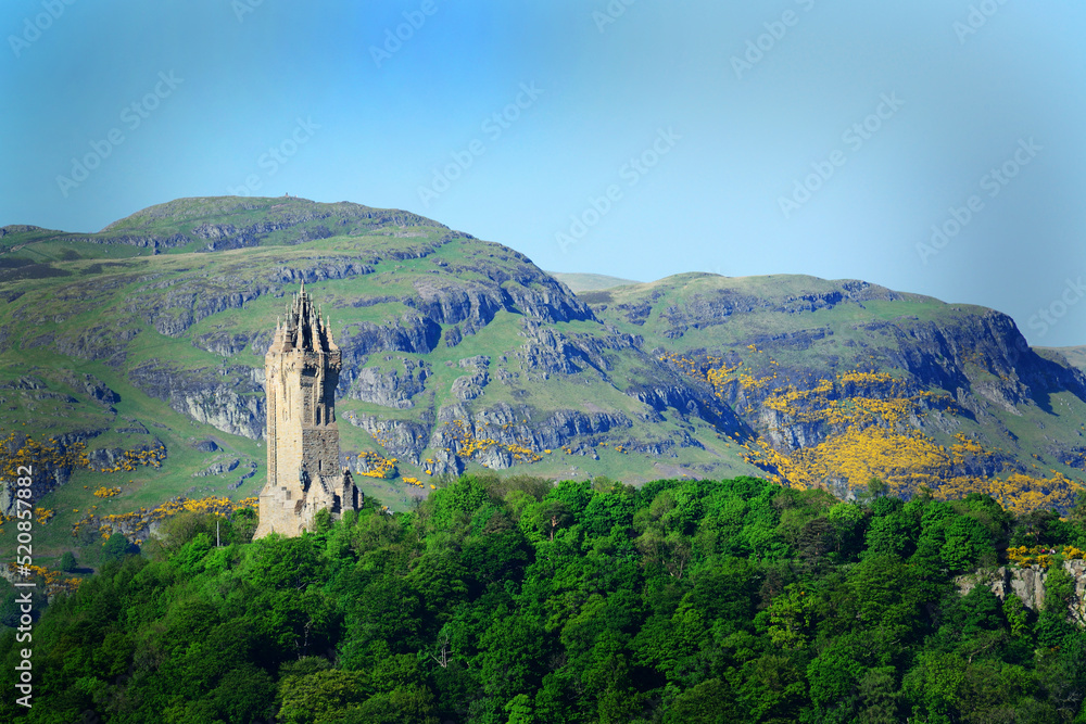 Fototapeta premium The Wallace Monument, with the Ochil Hills beyond, seen at Stirling, Scotland