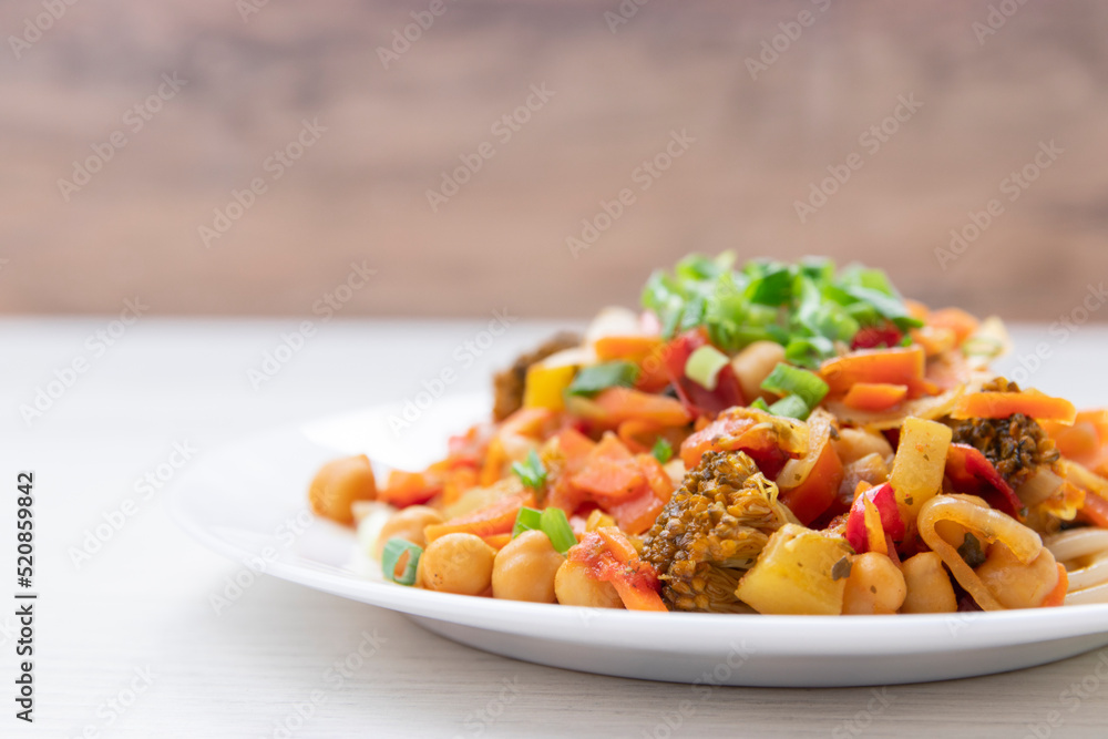 Pasta with tomato sauce, chickpeas pasta with chickpeas and vegetables. vegetarian food