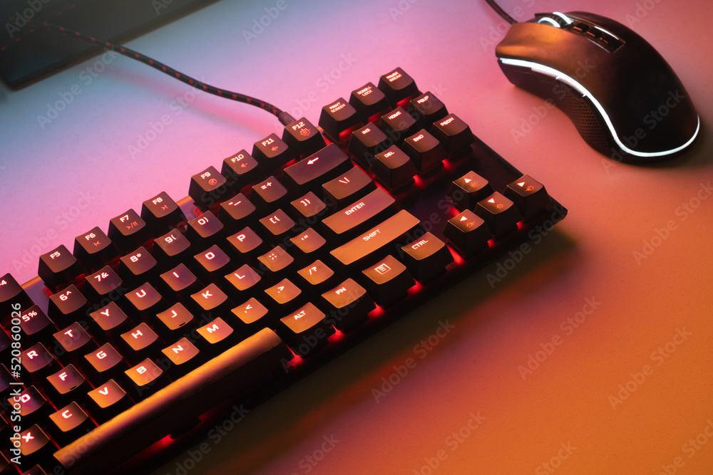 Gaming keyboard. Keyboard with mouse, neon light. Mechanical keyboard with Red light. gaming