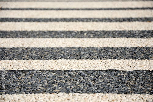 Details of a striped black and white sidewalk in Punta del Este, Maldonado, Uruguay photo
