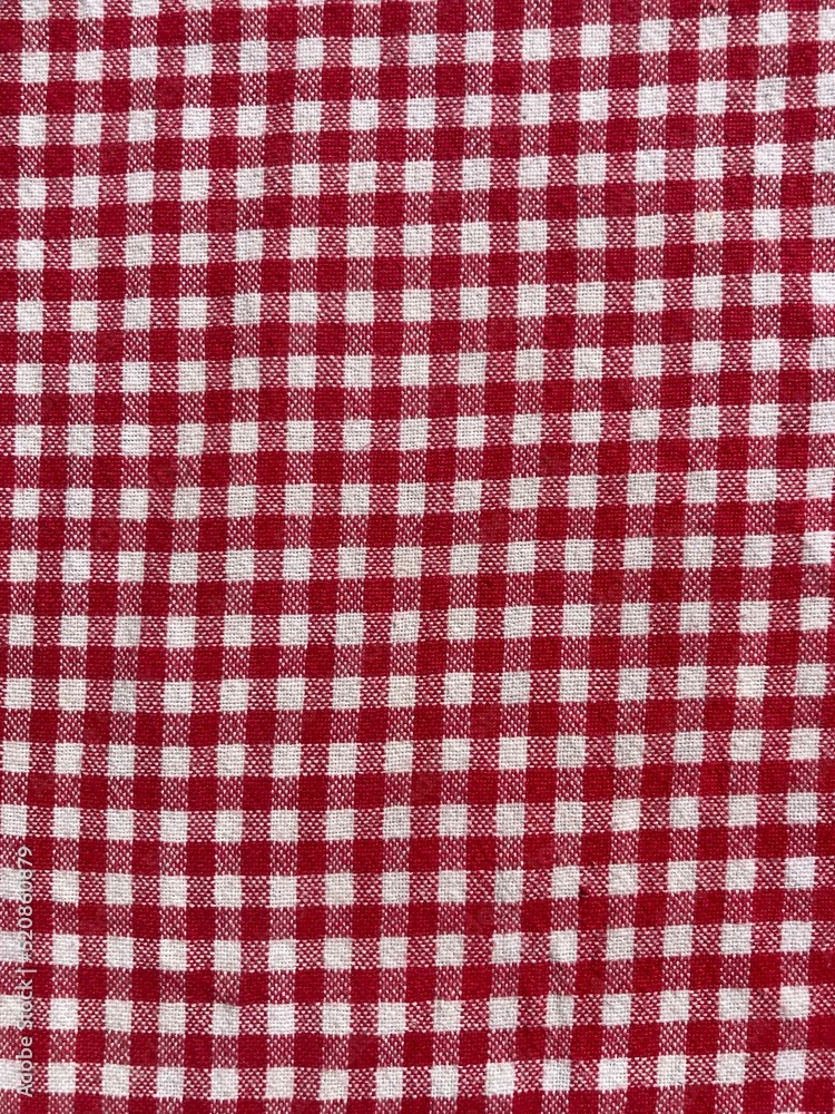 a red and white checkered fabric surface a red and white checkered fabric surface