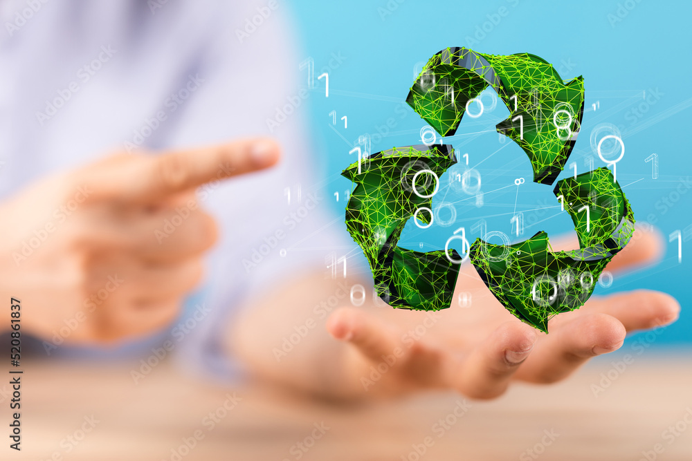 hand holding green recycle symbol hand holding green recycle symbol