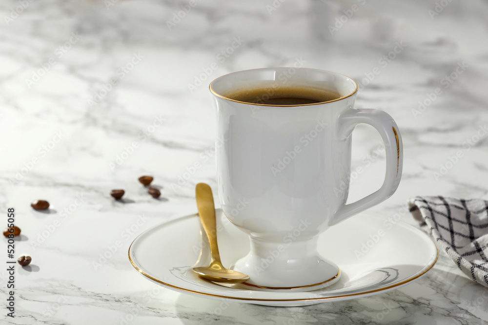 A cup of coffee on the table in the morning of a beautiful holiday day and a free seat A cup of coffee on the table in the morning of a beautiful holiday day and a free seat