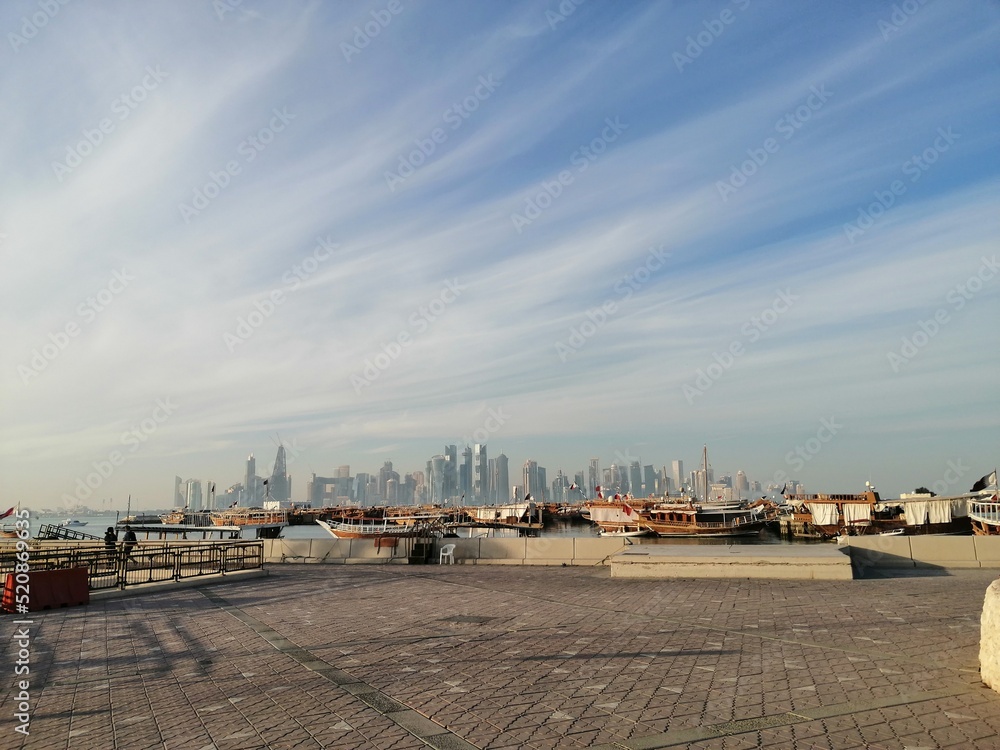 Doha Skyline with old traditional boats Qatar
