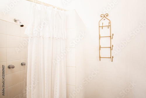 View of a rural bathroom. White room for hygiene in rural house. Bathroom in family home.