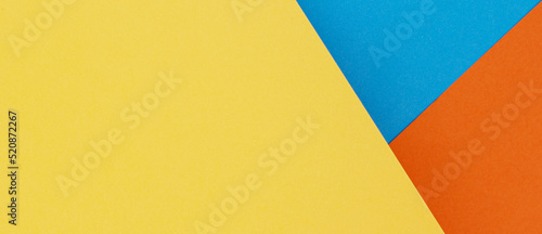 Yellow, blue and orange color paper background