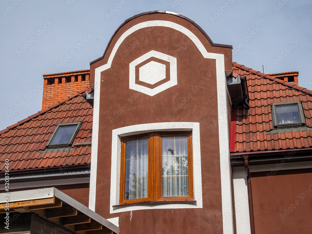 Zelenogradsk, Russia, June 16, 2022. Typical architectural ensemble in the area of historical urban development. Fragment of facade of typical house Zelenogradsk, Russia, June 16, 2022. Typical architectural ensemble in the area of historical urban development. Fragment of facade of typical house
