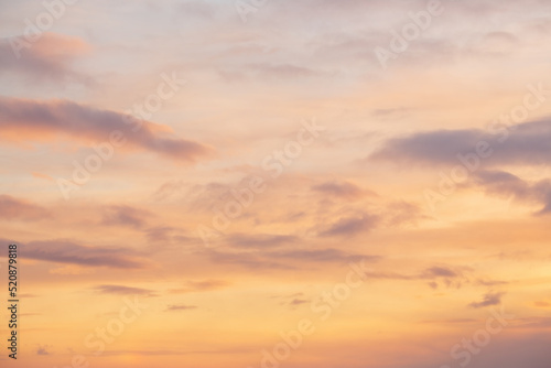 Beautiful sunset sky background with clouds. Scenic cloudscape.