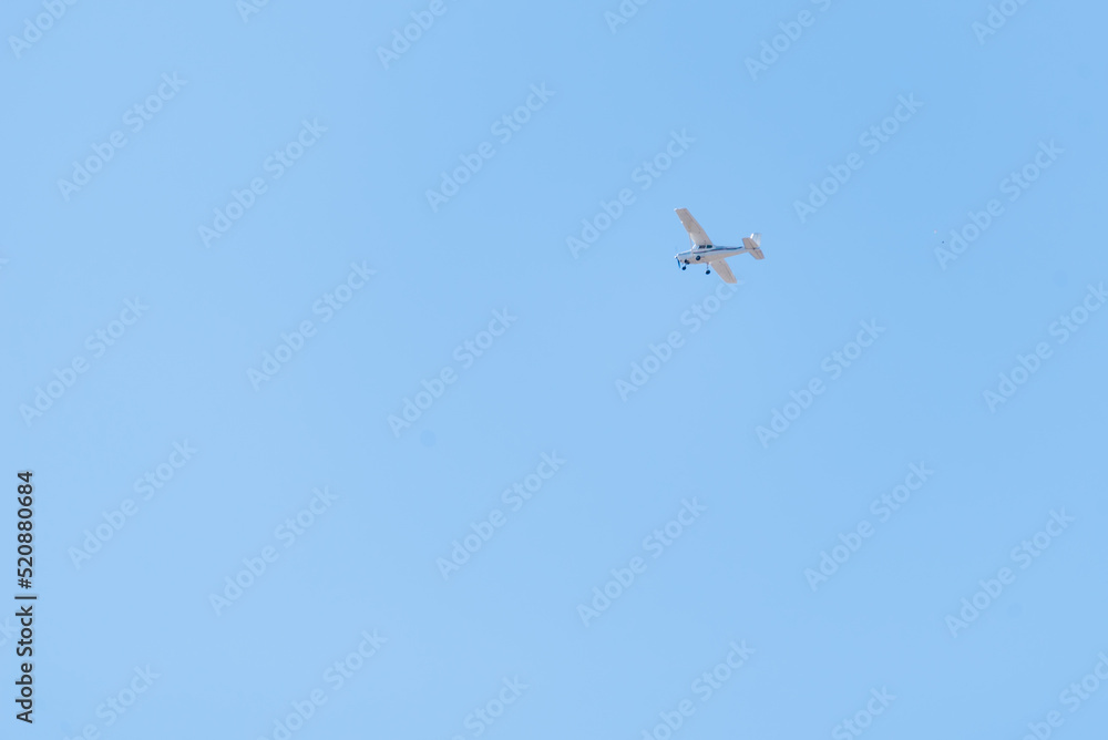 plane flying in a sunny and clear sky plane flying in a sunny and clear sky