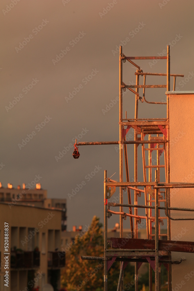 Building scaffolding, thermal insulation of the building and booths for cake Building scaffolding, thermal insulation of the building and booths for cake