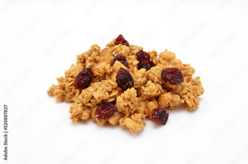 whole grain muesli with cranberries isolated on white background whole grain muesli with cranberries isolated on white background
