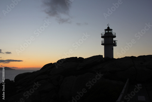 sunset from a lighthouse in the Cantabrian sea